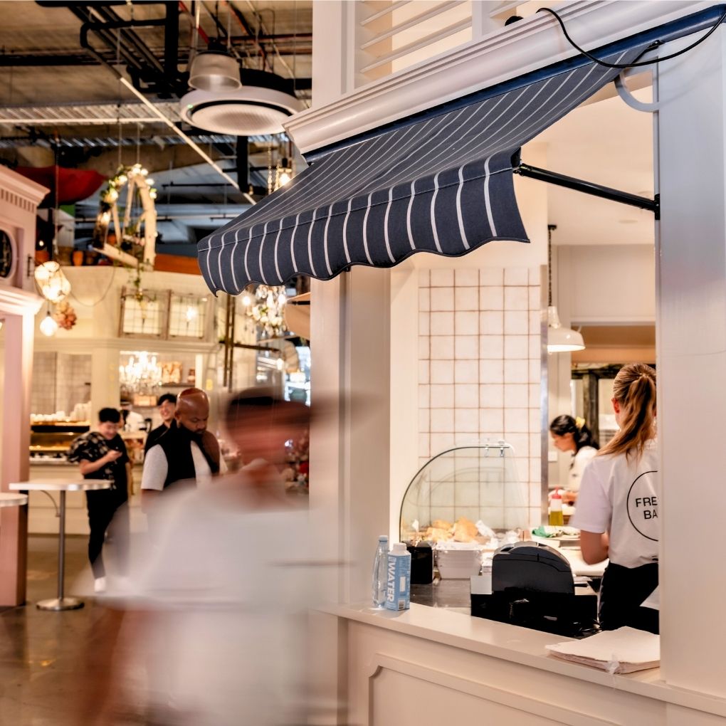 Fixed Pivot Arm Awning by Outdoor Blinds and Awnings (OBA)
