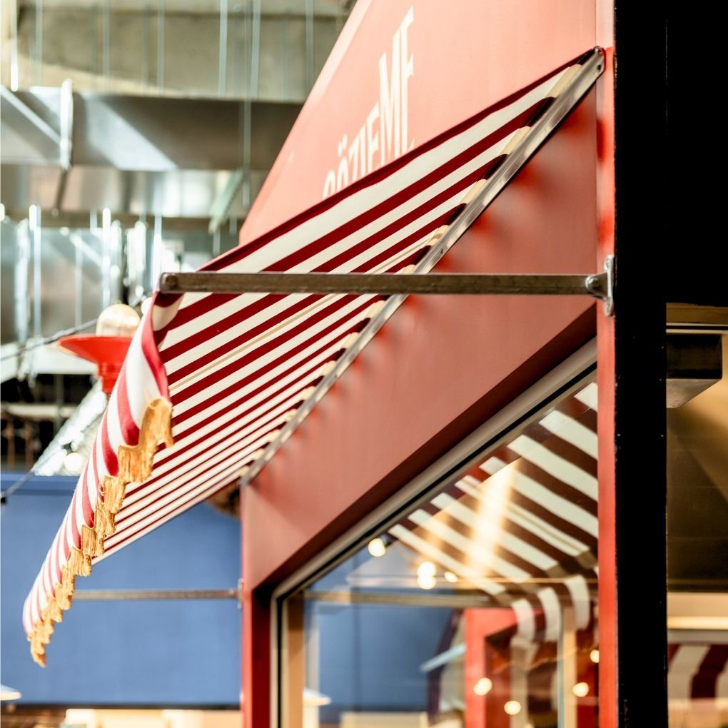 Fixed Pivot Arm Awning by Outdoor Blinds and Awnings (OBA)