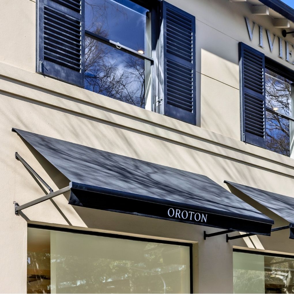 Fixed Pivot Arm Awning by Outdoor Blinds and Awnings (OBA)
