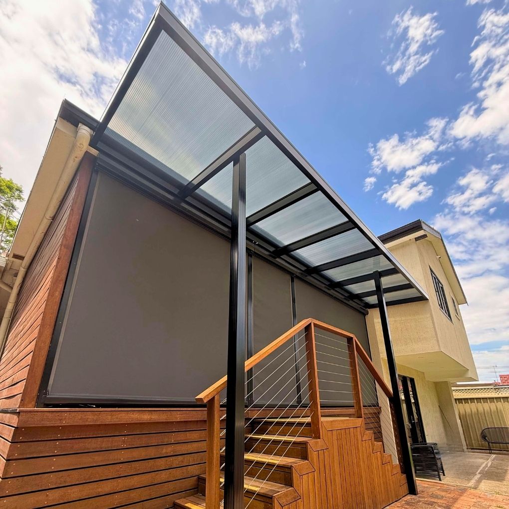 Polycarbonate Pergola and Screentex Zip Outdoor Blinds by Outdoor Blinds and Awnings (OBA)