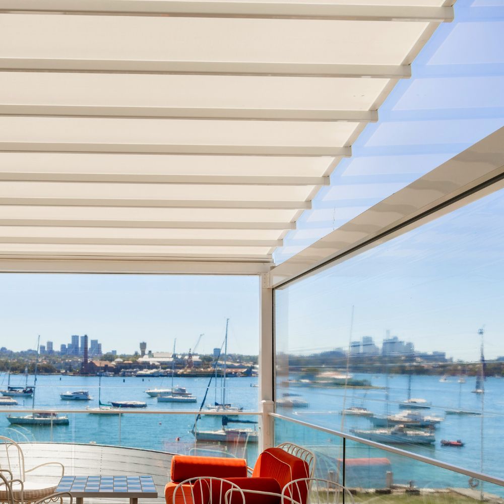 Med Evo Retractable fabric roof and screentex zip outdoor blinds for Ecco restaurante by Outdoor Blinds and Awnings (OBA)