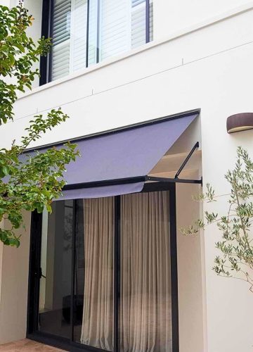 Fixed Pivot Arm Awning by Outdoor Blinds and Awnings (OBA)